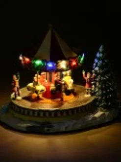 Christmas Warehouse Kids Enjoying A Winter Fun Park Merry-Go-Round Christmas Village Scene - 23Cm><noscript><img width=